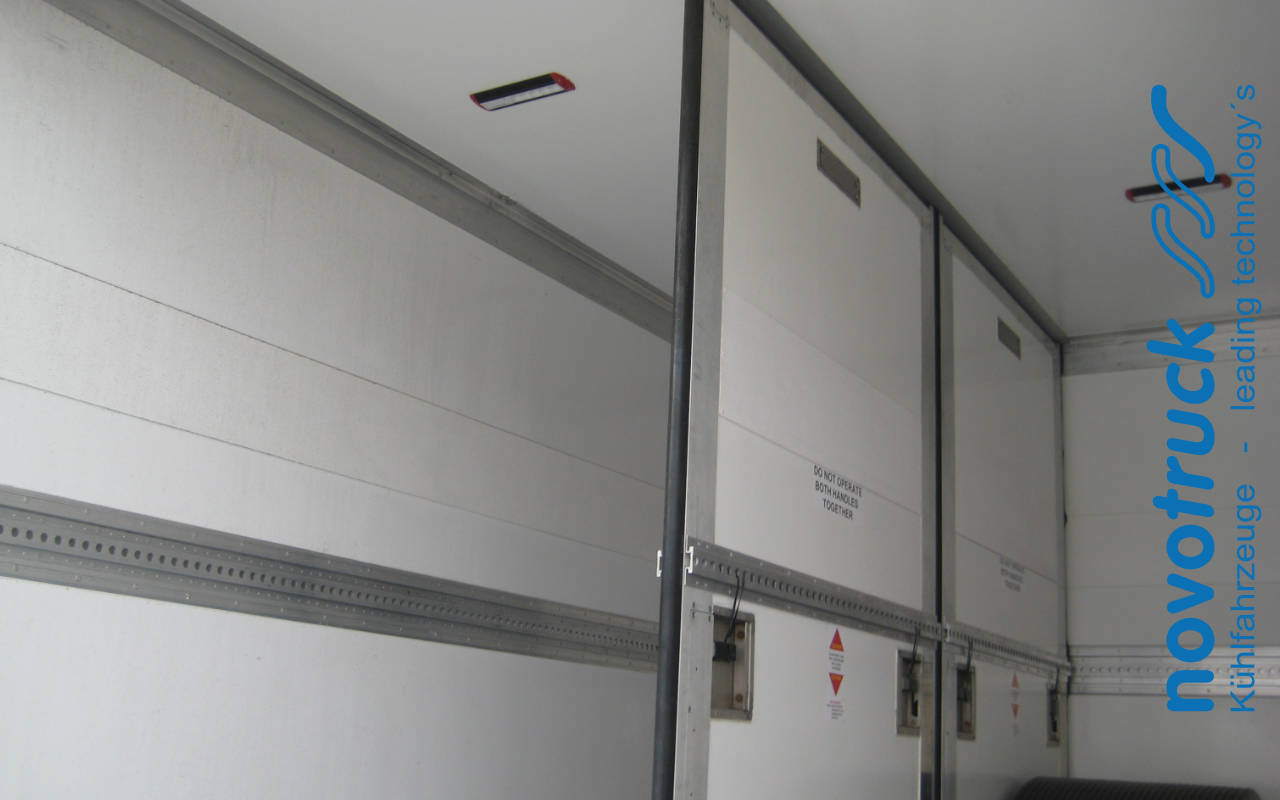 Refrigerated box body partition wall system adjustable